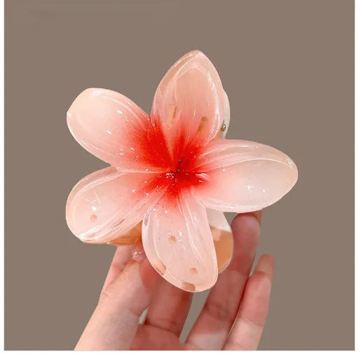 🌺 Pince Fleur Hawaïenne – L’Accessoire Tendance de l’Été ✨