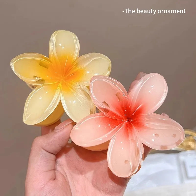 🌺 Pince Fleur Hawaïenne – L’Accessoire Tendance de l’Été ✨