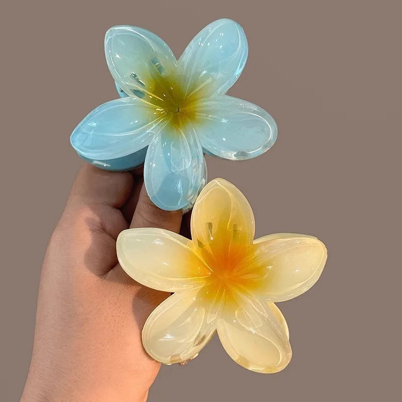 🌺 Pince Fleur Hawaïenne – L’Accessoire Tendance de l’Été ✨